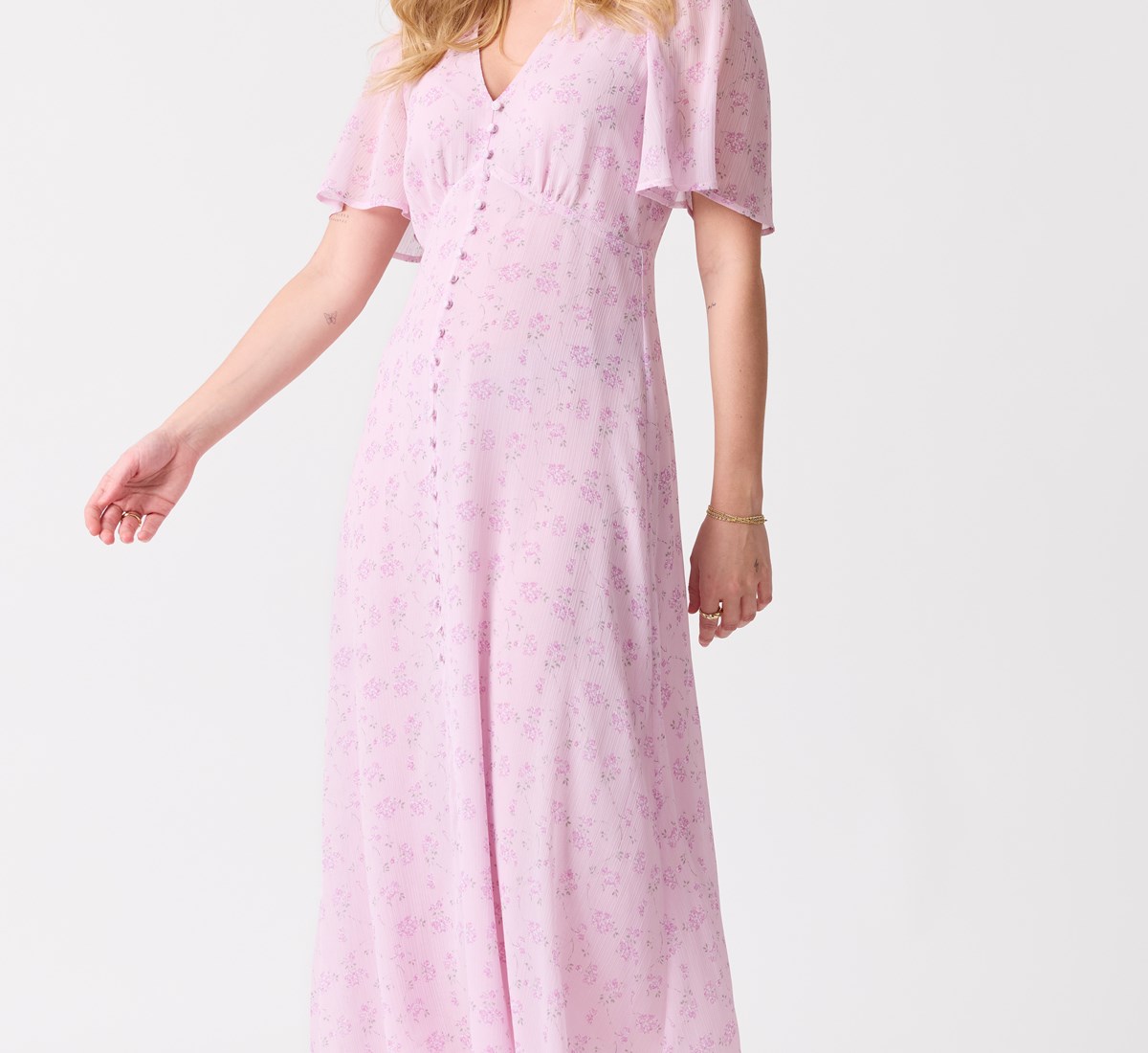 Dame med rosa kjole