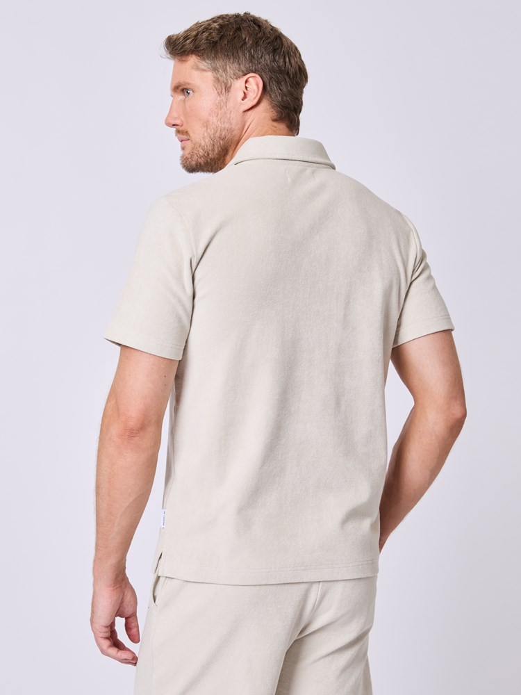 Nalu polo t-skjorte 7511353_I3O-MRCAPUCHIN-H25-Modell-Back_chn=vic_8779_Nalu polo t-skjorte I3O 7511353.jpg_Back||Back