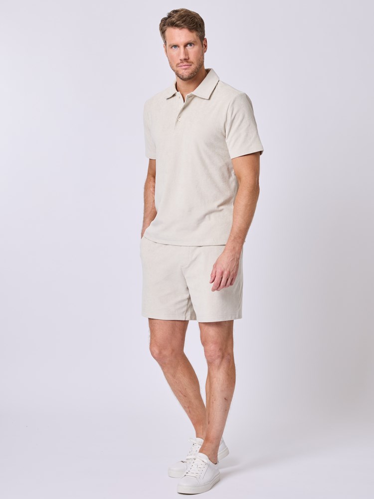 Nalu polo t-skjorte 7511353_I3O-MRCAPUCHIN-H25-Modell-Front_chn=vic_1732_Nalu polo t-skjorte I3O 7511353.jpg_Front||Front